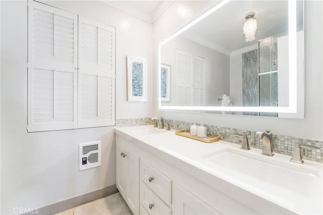 31561 Table Rock Dr Unit 211, Laguna Beach, CA 92651 - full bath with heating unit, crown molding, double vanity, and a shower with shower door
