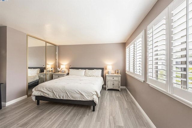 bedroom featuring light hardwood / wood-style flooring