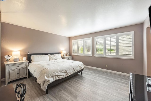 bedroom featuring light hardwood / wood-style floors