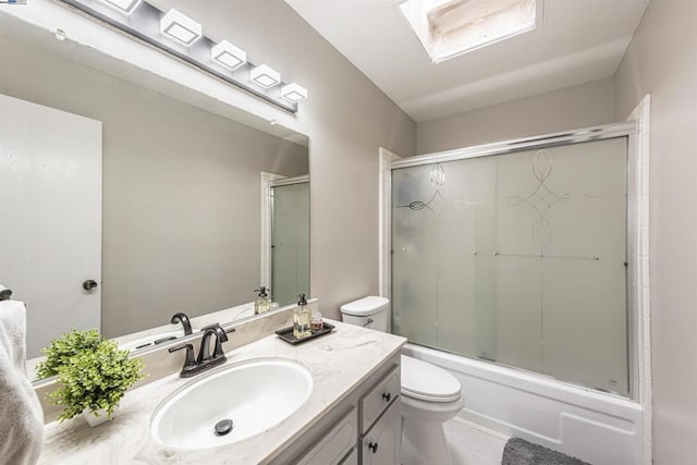 full bathroom featuring vanity, toilet, and enclosed tub / shower combo