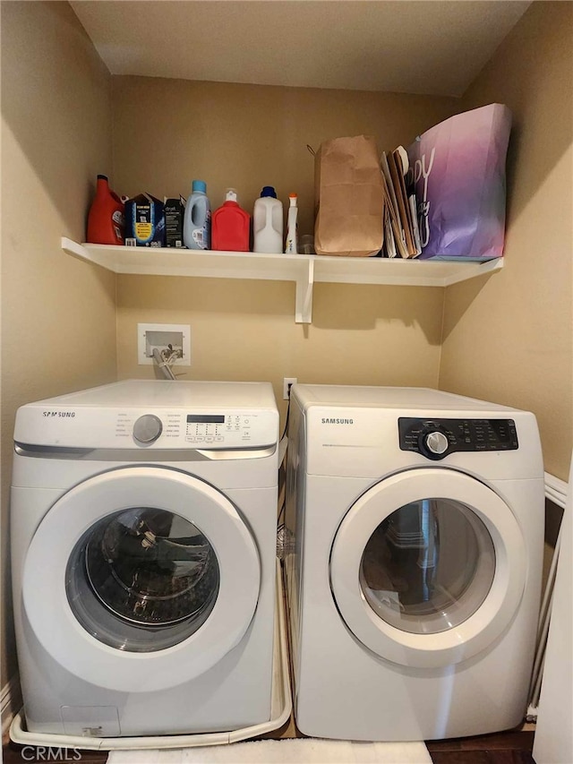 laundry room featuring independent washer and dryer