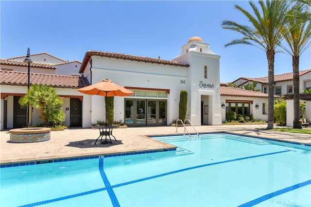 rear view of house with a patio area