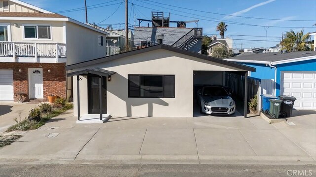 view of front of home featuring a carport