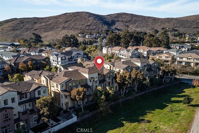 drone / aerial view featuring a mountain view