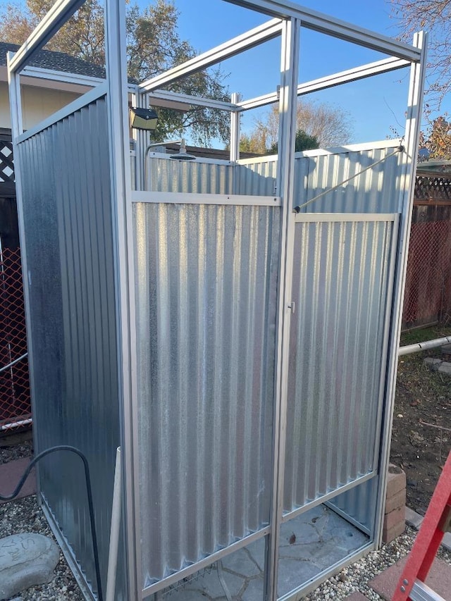 exterior space featuring an outbuilding