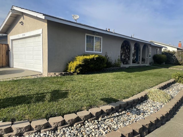 ranch-style home with a garage and a front yard