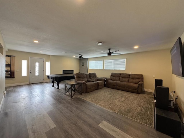 living room with ceiling fan, wood-type flooring, pool table, and a healthy amount of sunlight