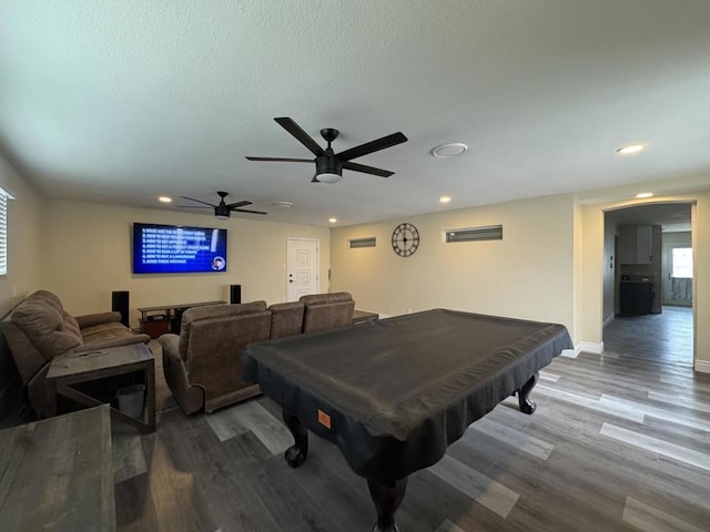 recreation room featuring ceiling fan, hardwood / wood-style floors, billiards, and a textured ceiling