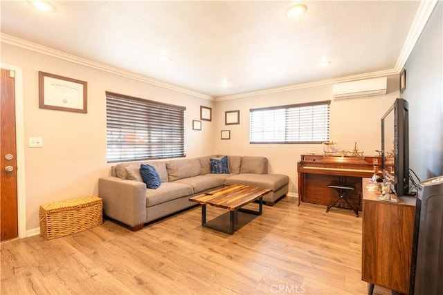 living room featuring light hardwood / wood-style floors, an AC wall unit, and ornamental molding