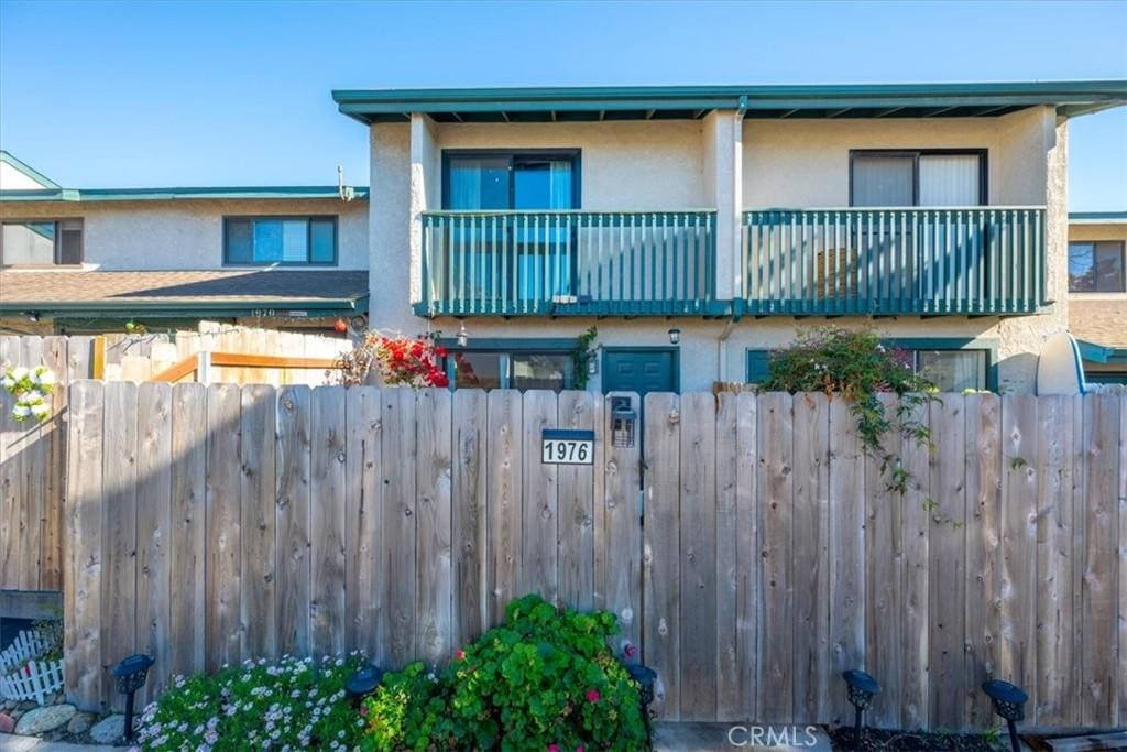 exterior space with a balcony