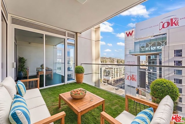 balcony featuring an outdoor living space