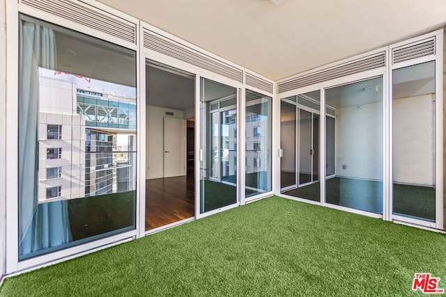 view of unfurnished sunroom