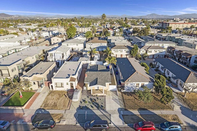 drone / aerial view featuring a mountain view