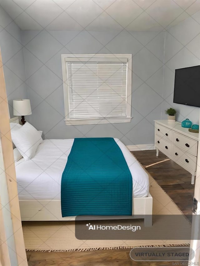 bedroom featuring hardwood / wood-style flooring