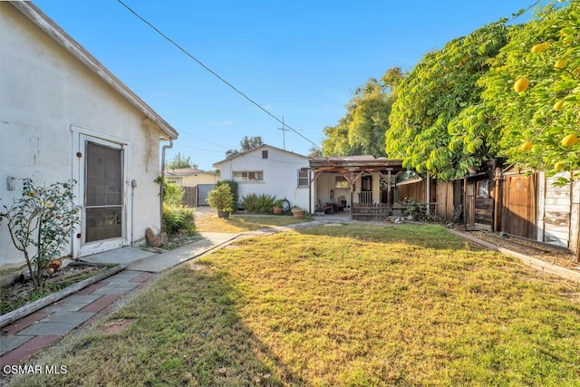 view of yard with a pergola