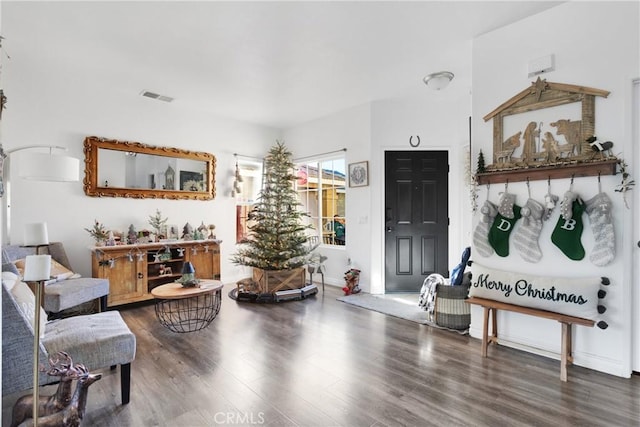 sitting room with hardwood / wood-style flooring