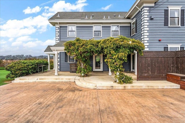 view of front of property featuring a patio area