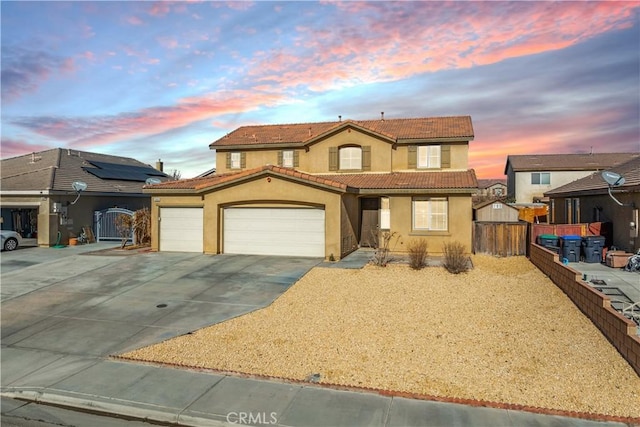 view of front of property featuring a garage