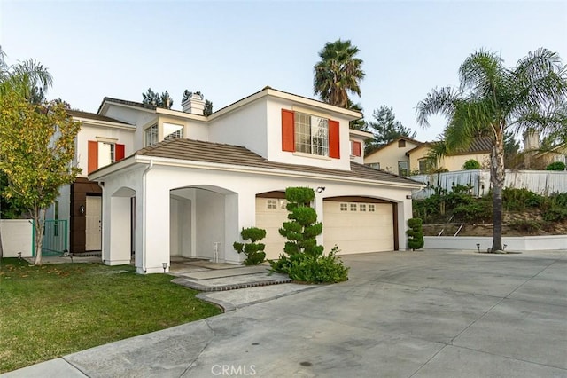 view of front of property featuring a garage