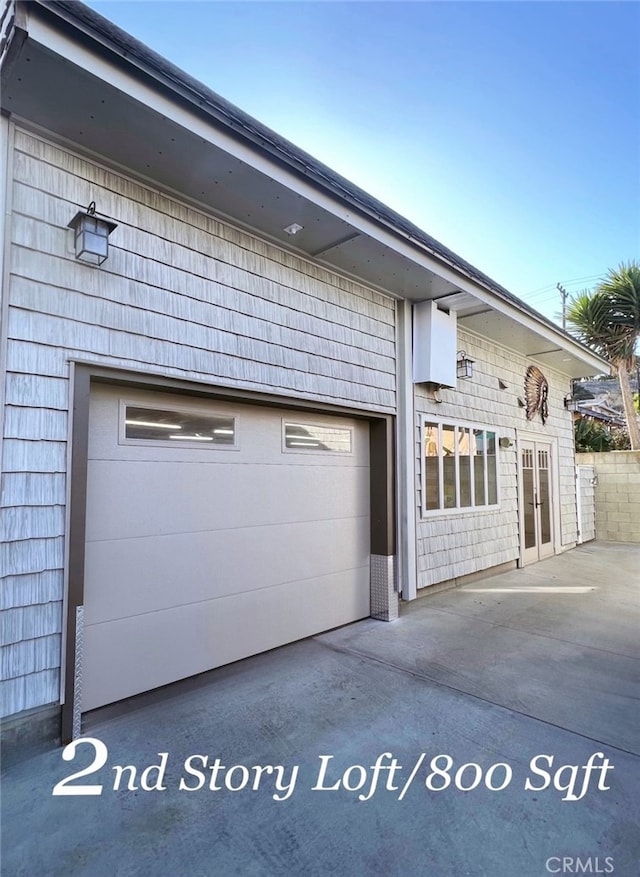 exterior space with a garage