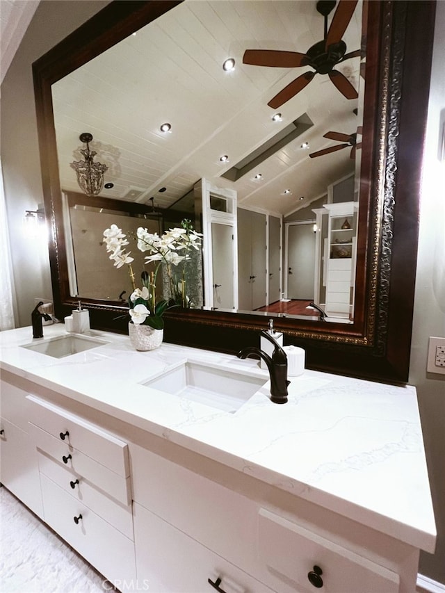 bathroom with vanity, vaulted ceiling, and wooden ceiling