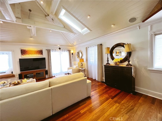 living room featuring wood ceiling, wood-type flooring, lofted ceiling with skylight, and a wealth of natural light