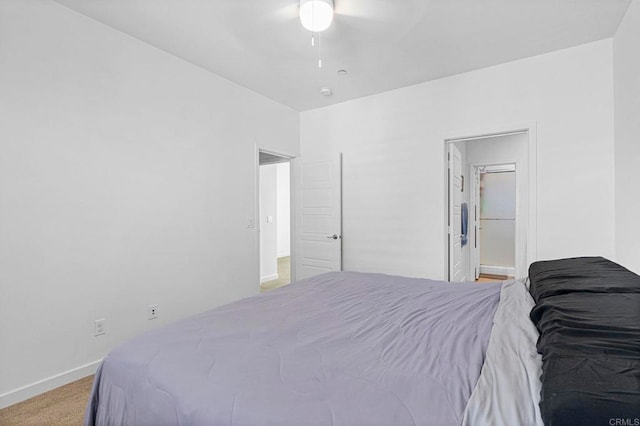 bedroom with ceiling fan and carpet floors