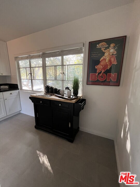 kitchen with white cabinets