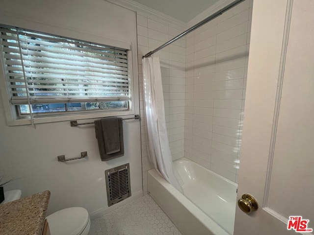 full bathroom featuring shower / bathtub combination with curtain, tile patterned floors, crown molding, toilet, and vanity