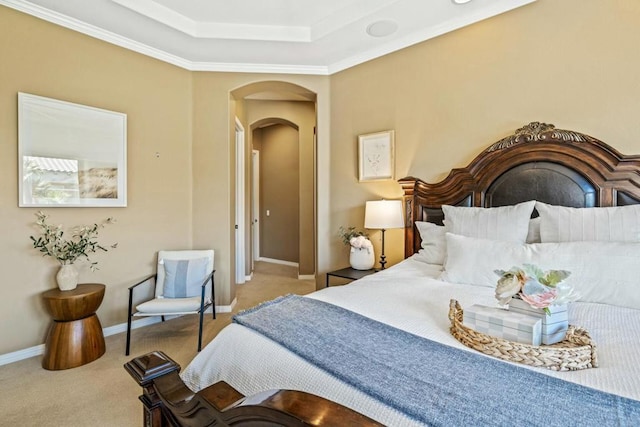 bedroom with light carpet and crown molding