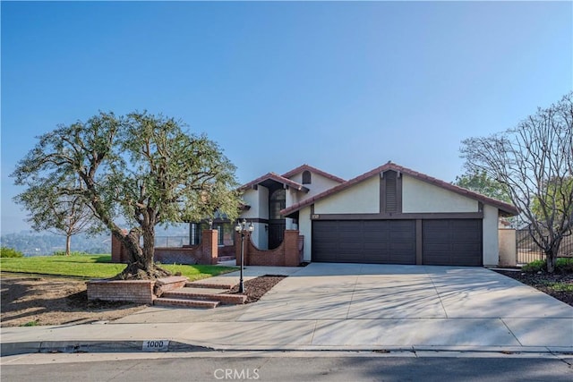 view of front of property featuring a garage