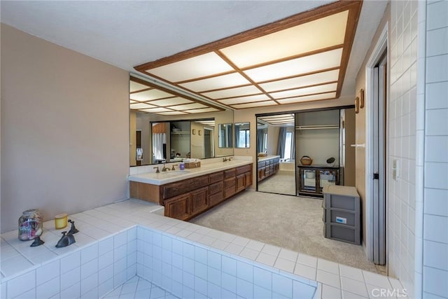 bathroom with double vanity and a sink