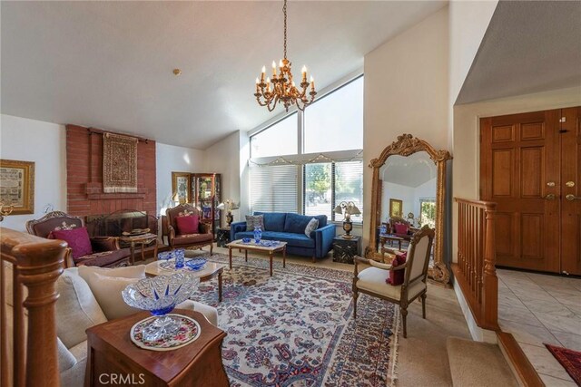 tiled living room featuring a fireplace, high vaulted ceiling, and an inviting chandelier