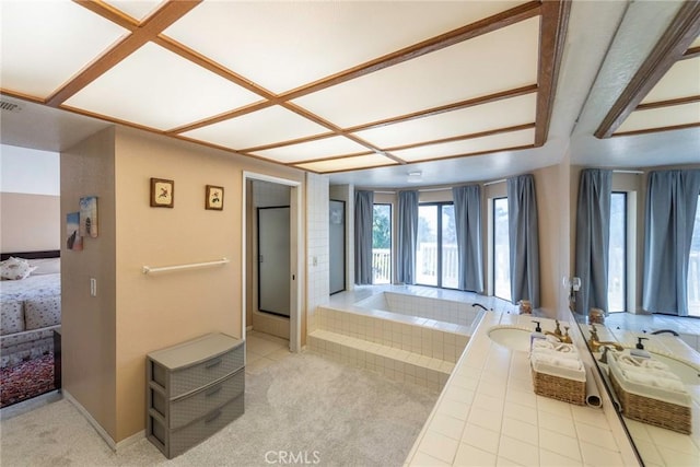 bathroom featuring visible vents, ensuite bathroom, a sink, a bath, and tile patterned floors