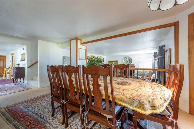 dining room featuring carpet floors