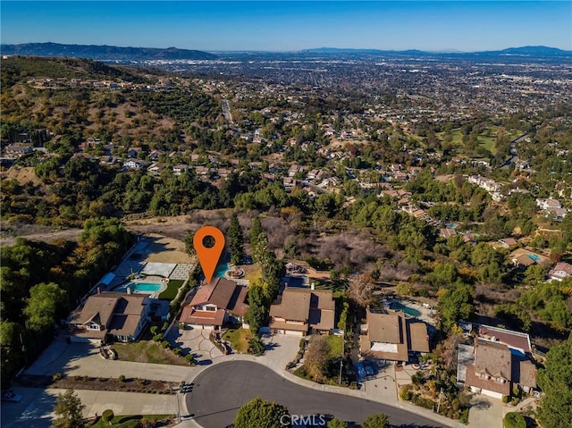 aerial view featuring a residential view and a mountain view