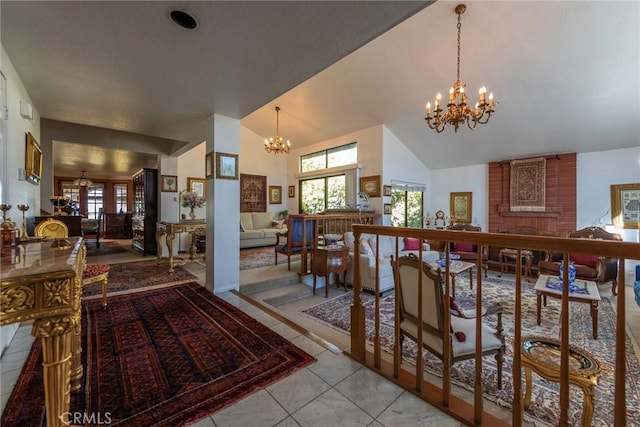 interior space with high vaulted ceiling, a notable chandelier, and light tile patterned floors