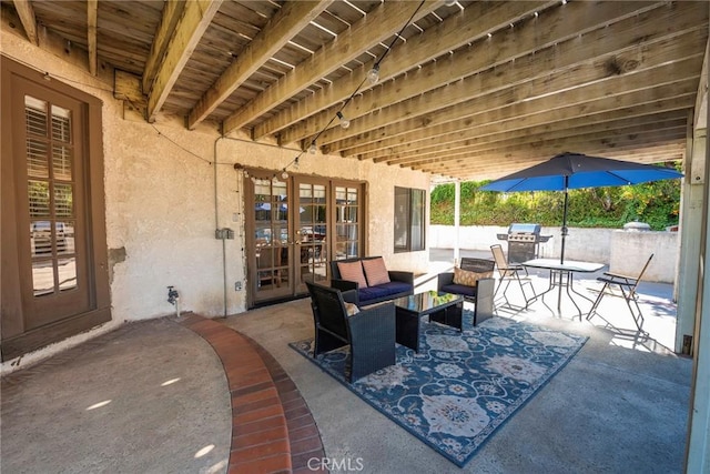 view of patio with french doors and area for grilling