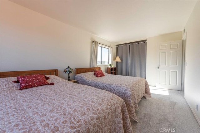 bedroom featuring carpet flooring