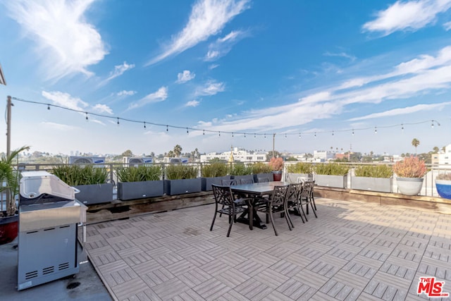 view of patio with a grill