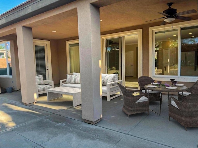 view of patio / terrace featuring ceiling fan