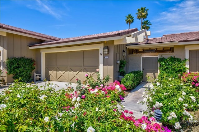 view of front of home with a garage