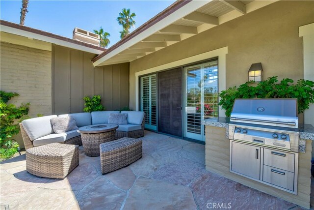 324 Sundance Cir, Palm Desert, CA 92211 - view of patio featuring area for grilling, a grill, and an outdoor hangout area