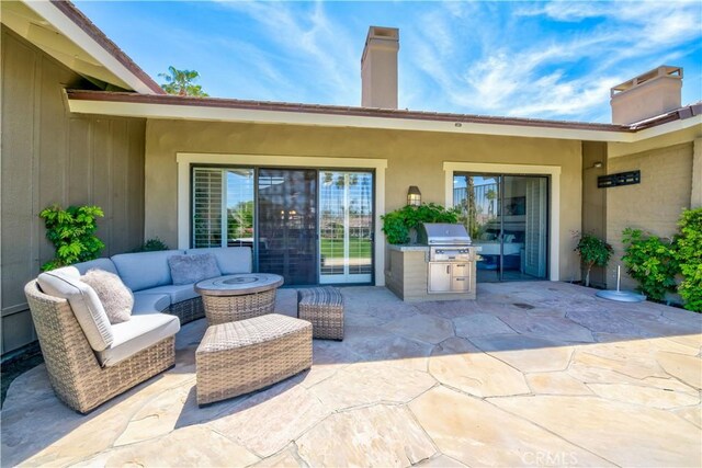 324 Sundance Cir, Palm Desert, CA 92211 - view of patio featuring outdoor lounge area and grilling area