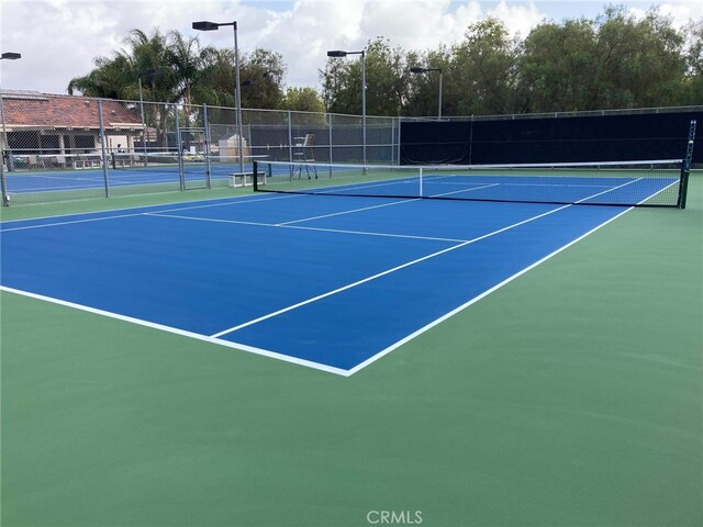 view of sport court featuring basketball court