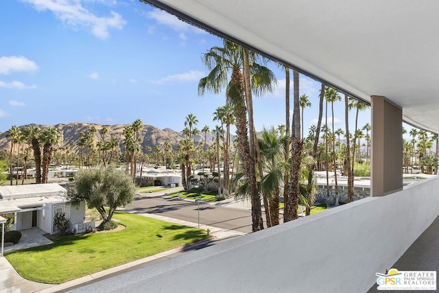 balcony featuring a mountain view