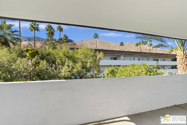 view of home's exterior with a mountain view