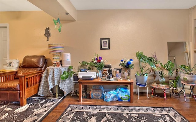 sitting room featuring hardwood / wood-style flooring