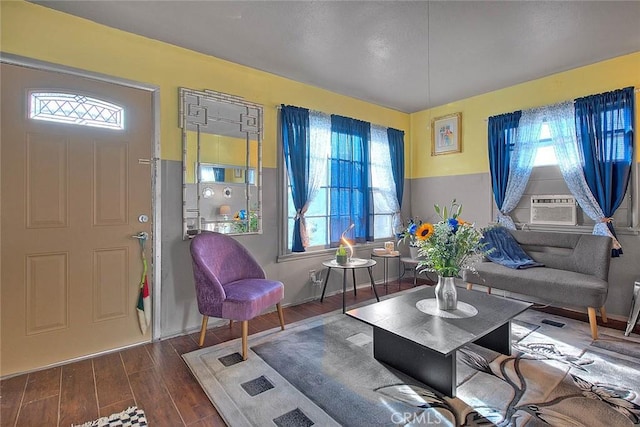 living room featuring hardwood / wood-style flooring and cooling unit