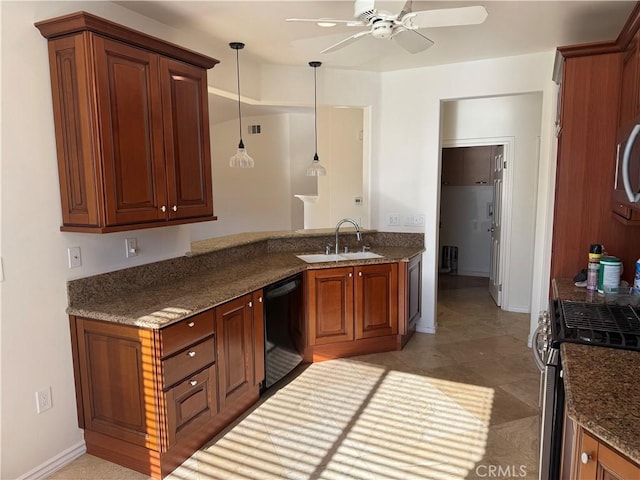 kitchen with kitchen peninsula, stainless steel appliances, ceiling fan, sink, and pendant lighting